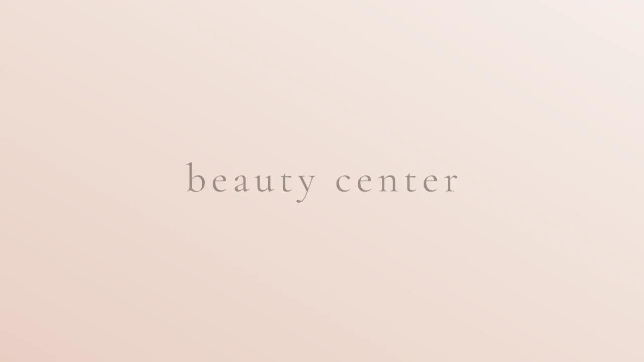 Woman lying down with hair fanned out — Lobna Beauty Center services